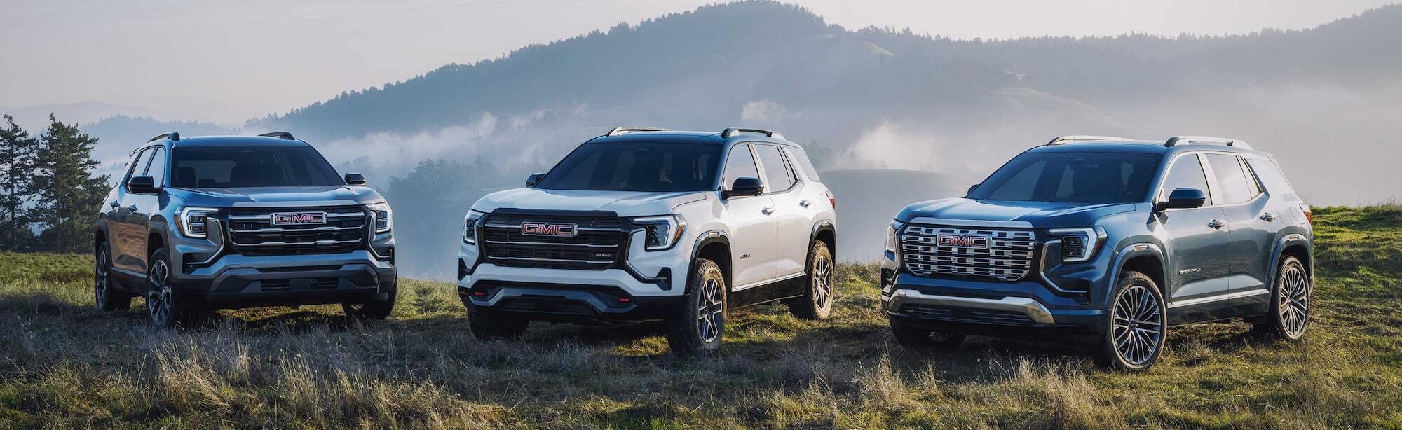 2026 GMC Terrain vehicles parked on grass