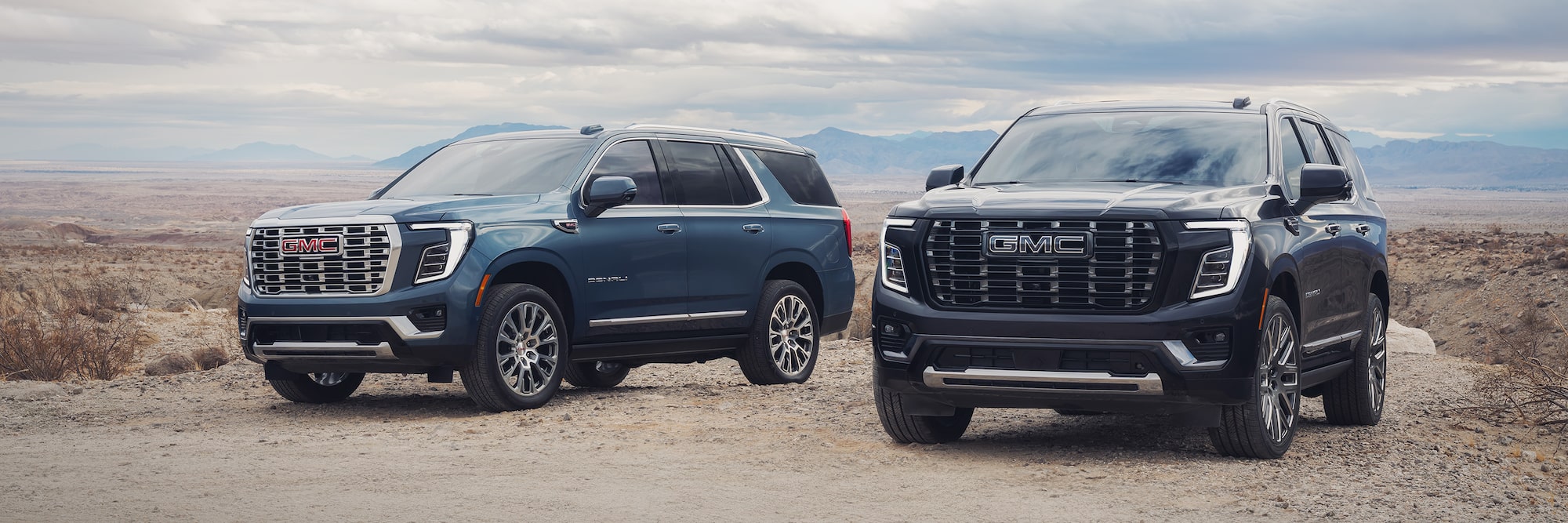 2026 GMC Yukon/Yukon XL parked next to each other