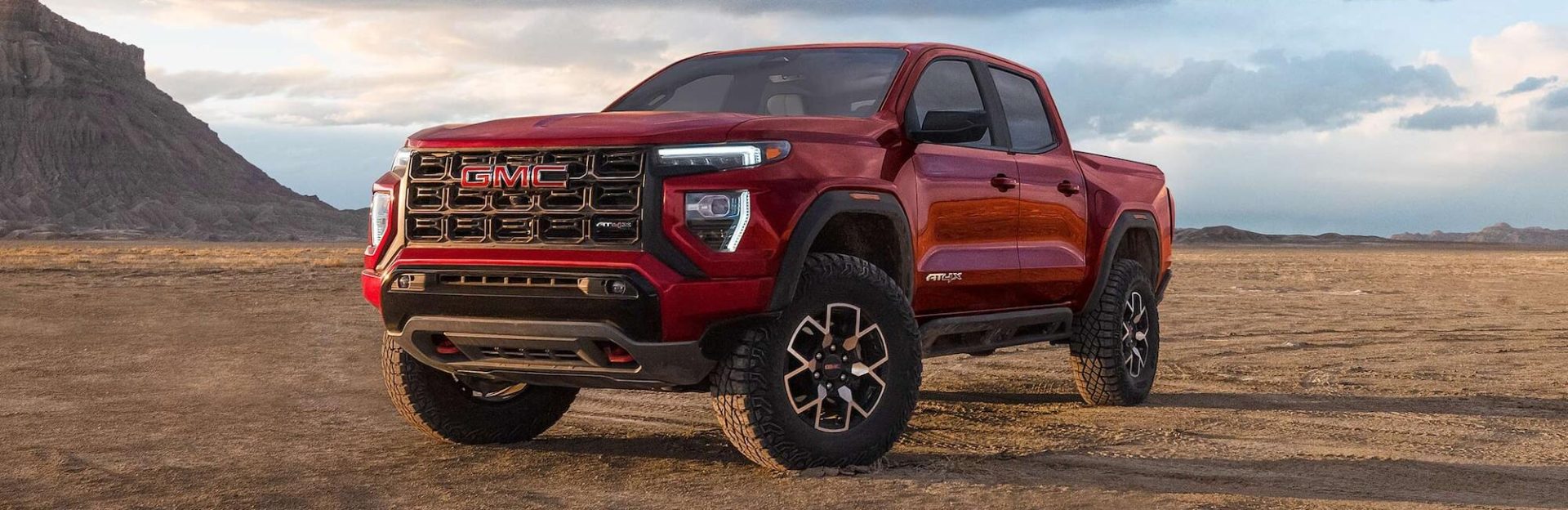 2026 GMC Canyon parked on sandy terrain