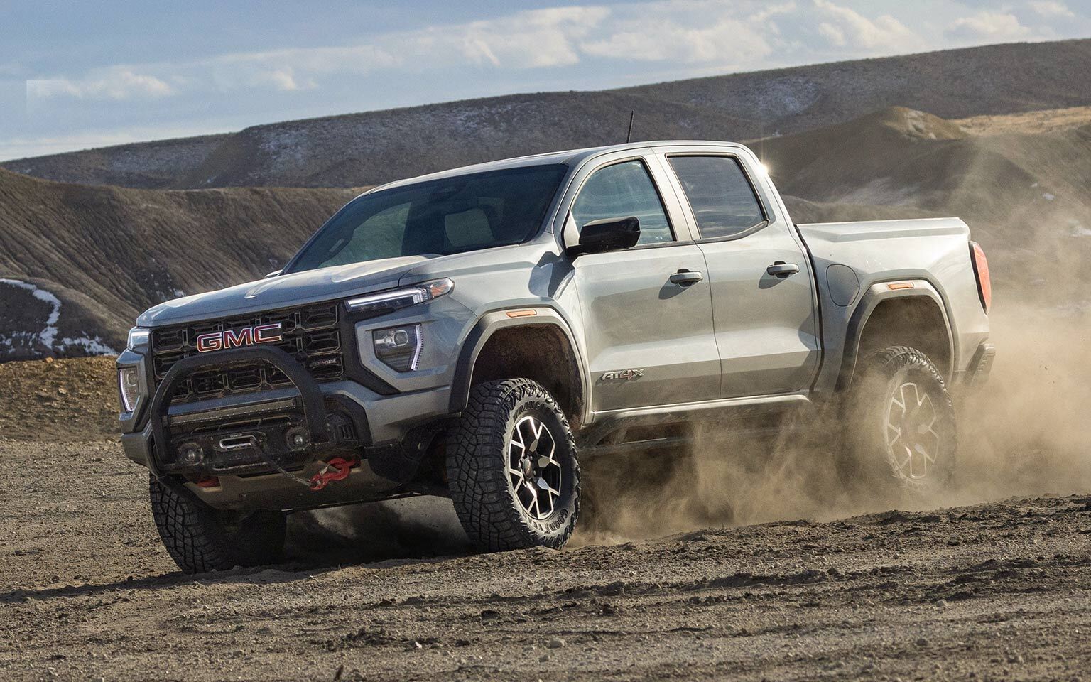 2026 GMC Canyon driving in sandy terrain