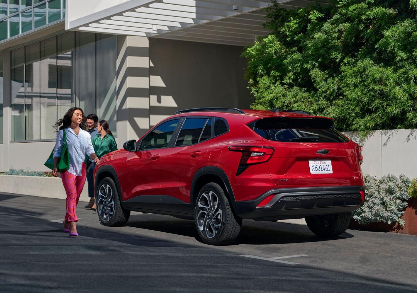 People walking near 2026 Chevrolet Trax parked outdoors